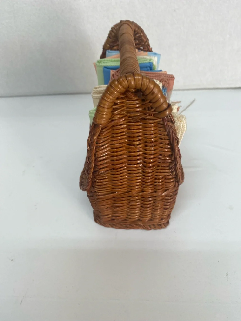Wicker Basket Woven Rattan with Assorted Pastel Linens Cloths Storage Dainty